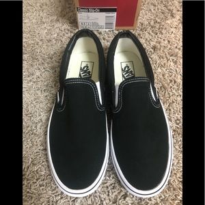 Vans slip on black